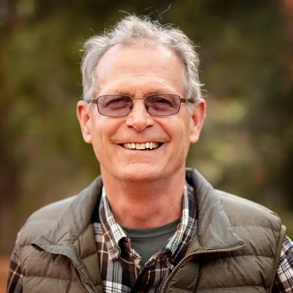 Headshot image of Founder Gil Hallows